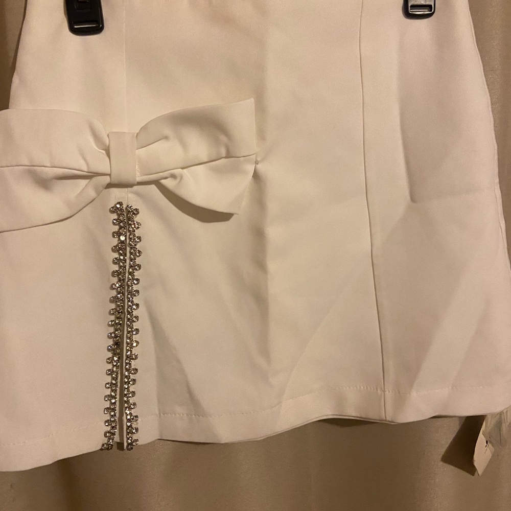 Elegant Cream Skirt with Bow and Rhinestone Detail